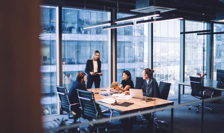 A view of professionals in a meeting.