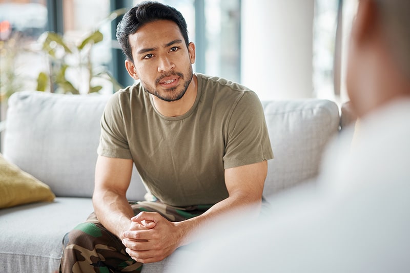 A veteran participates in therapy at a veterans drug rehab.