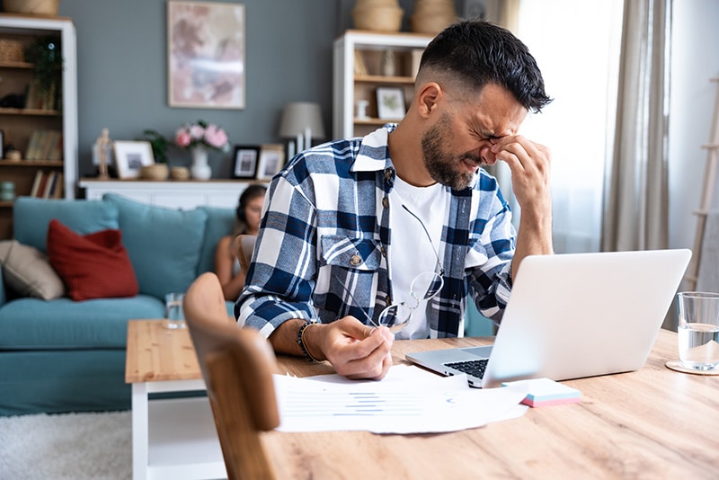 A man struggles with his mental health at work.