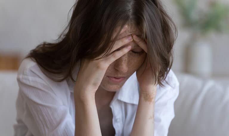 A woman experiences a bad mental health day.