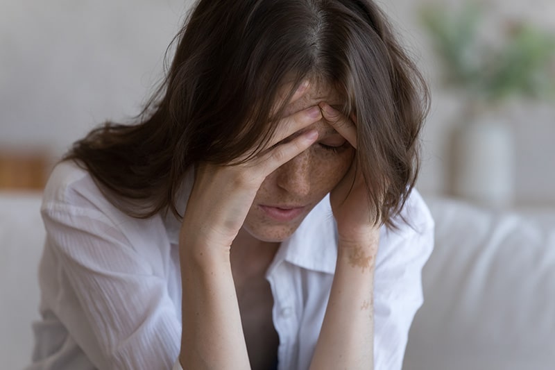 A woman experiences a bad mental health day.