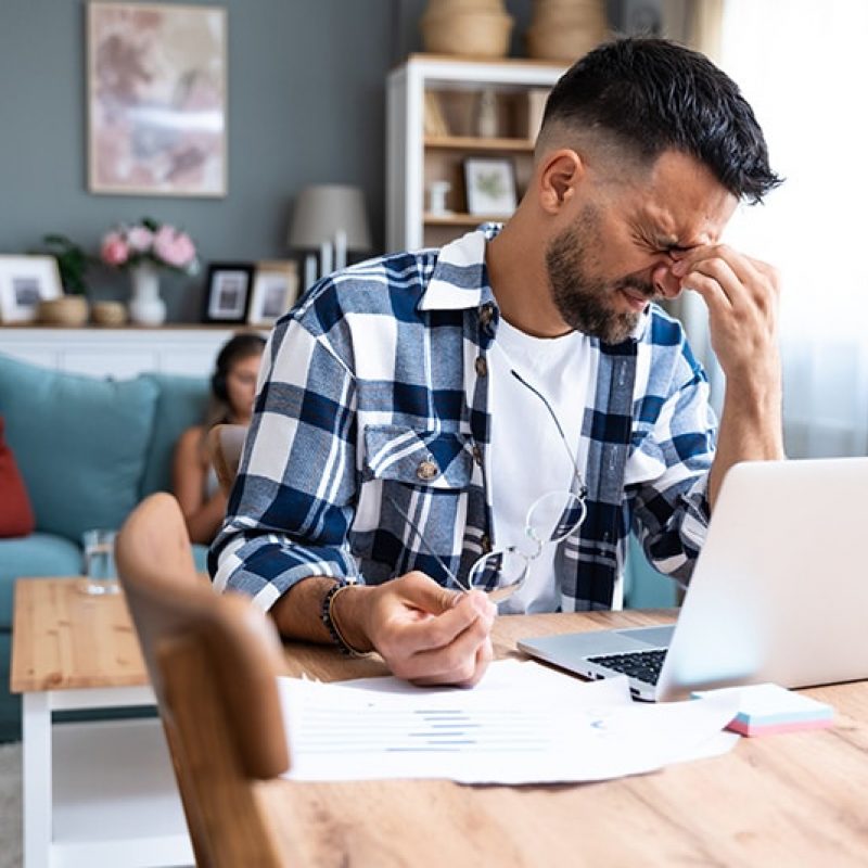 A man struggles with his mental health at work.